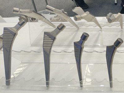 Titanium alloy femoral stem