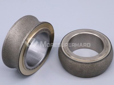 Metal sintered diamond roller